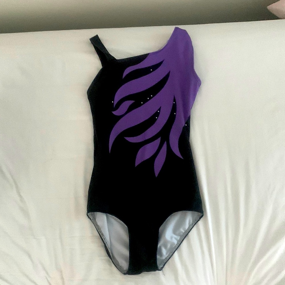This is black and purple gymnastics leotard
